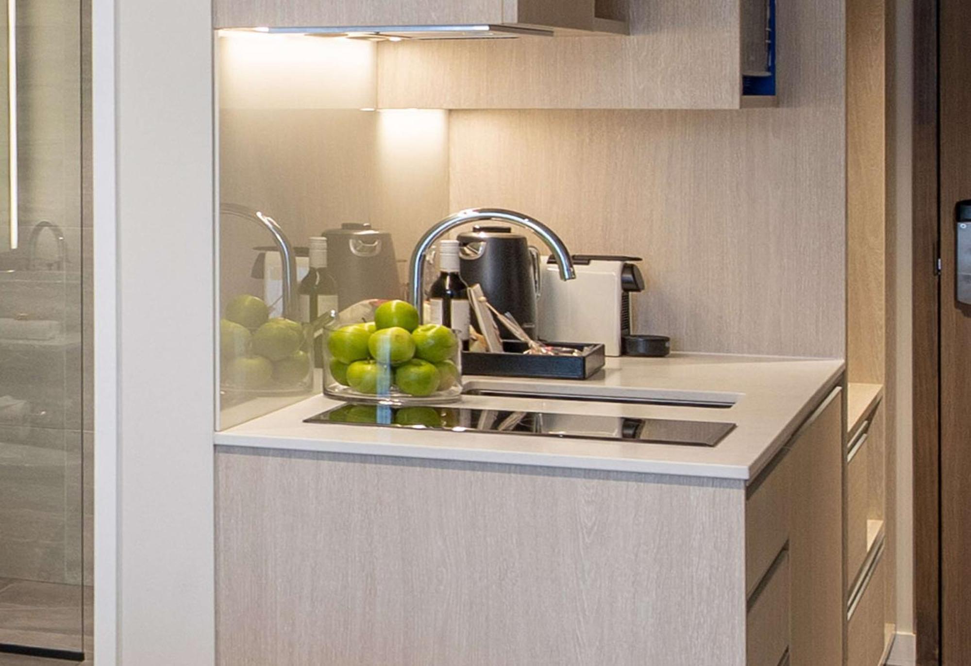 Sudima Christchurch City Buitenkant foto A kitchen in a serviced apartment